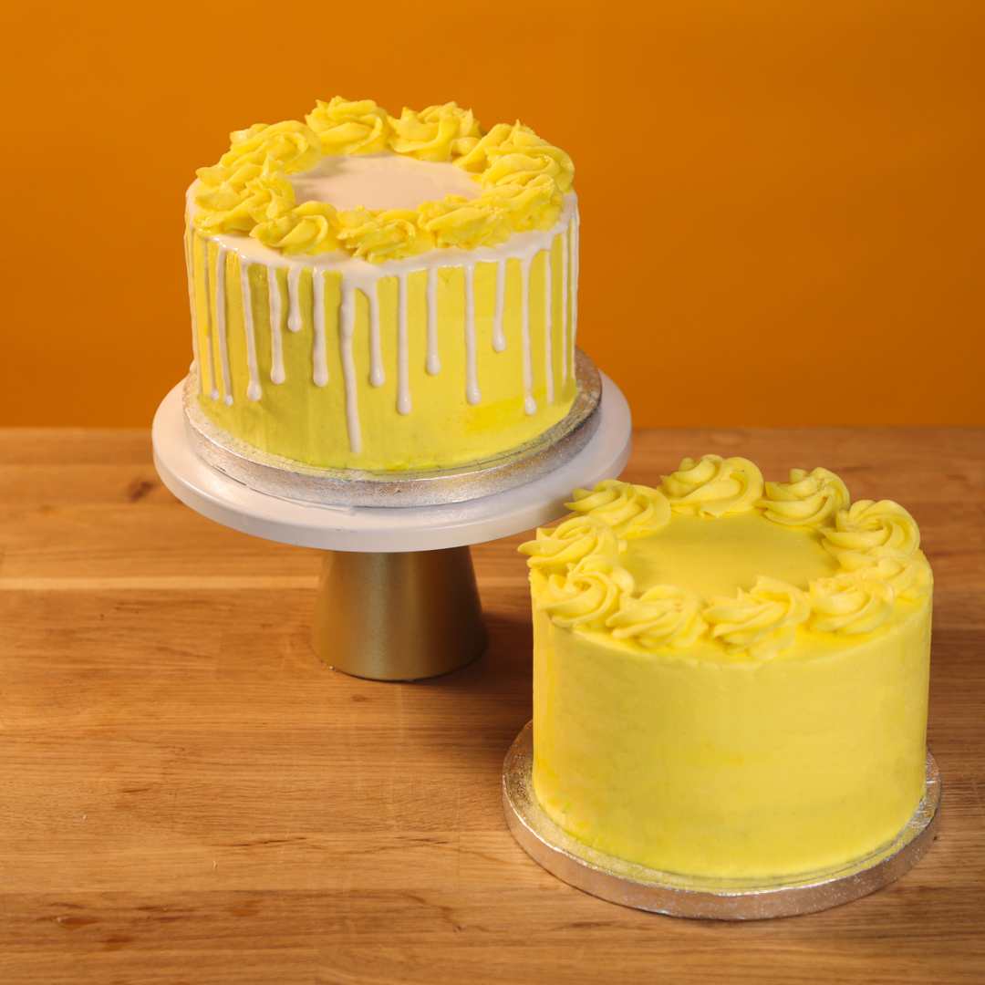 2 Lemon Keto Birthday cakes - celebration in mind with a white drip