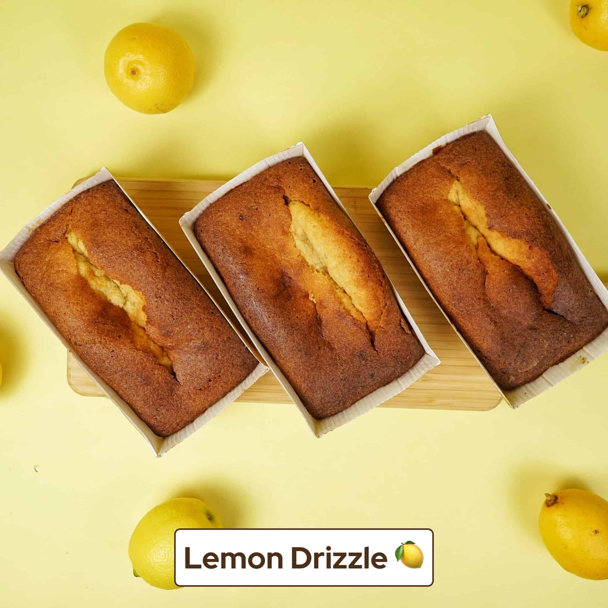 Three Summer Loaves Bundle lemon drizzle cakes on a yellow background, No Guilt Bakes keto loaf.
