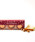 A festive Christmas box filled with No Guilt Bakes' Keto Mince Pies, including cinnamon-spiced cookies and aromatic cinnamon sticks. Perfect for spreading joy during the holiday season!