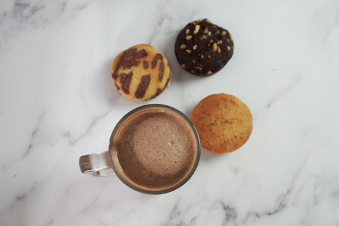 An Image of Hot Cocoa With Cake Bites